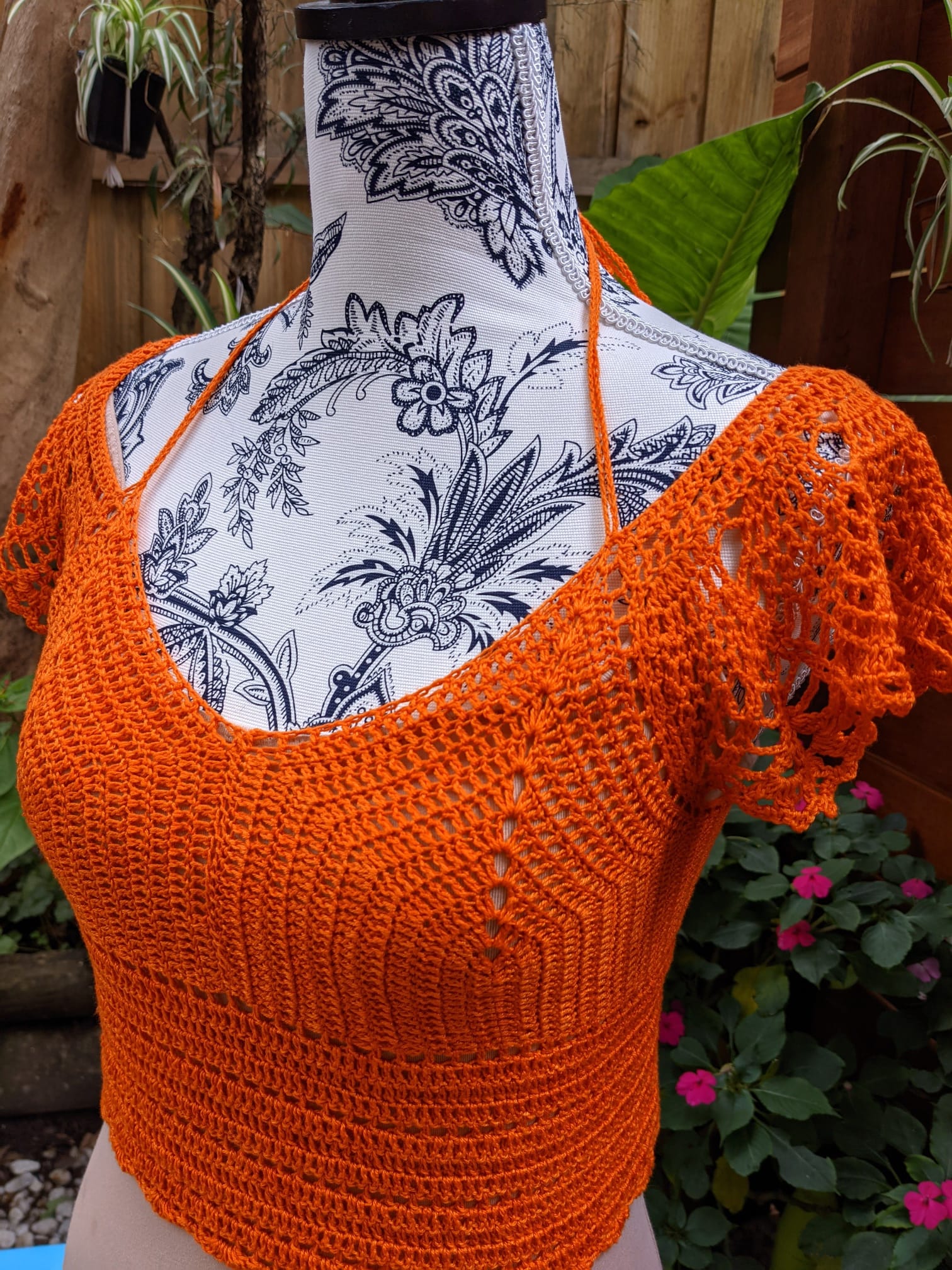 Hand-crocheted orange blouse